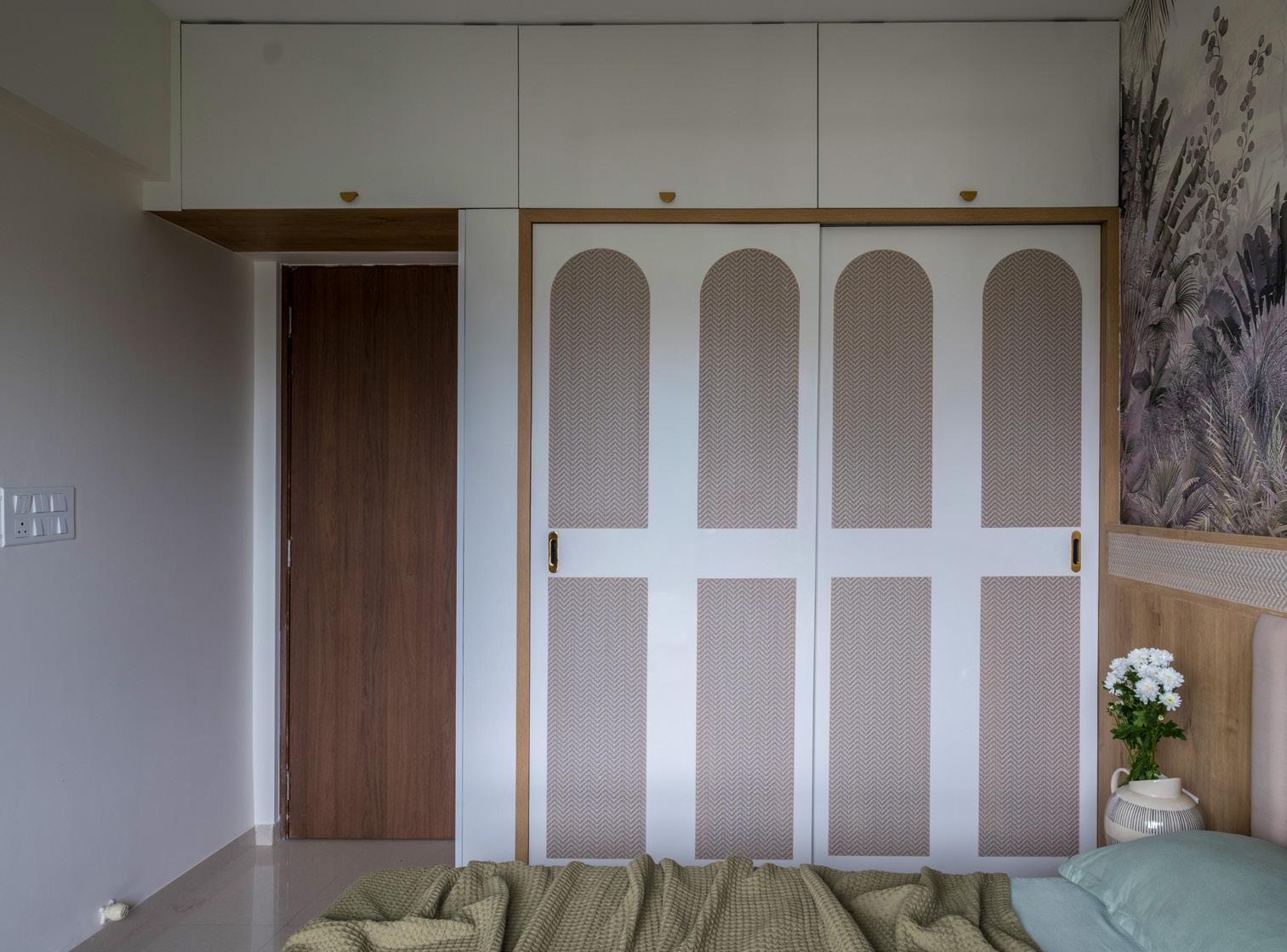 Courtyard living reimagined through warm minimalism and built-in design