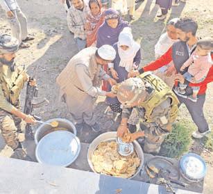 Army distributes food to locals at Lasana