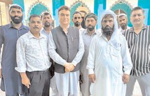 Sunil exchange Eid greetings with Muslim brethren at Bali Lower Madrasa Faiz-Aam
