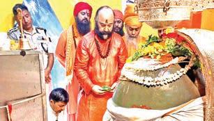 Lord Shiva's holy mace taken to Shankaracharya Temple