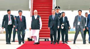 Modi lands in China; all eyes on his talks with Prez Xi today