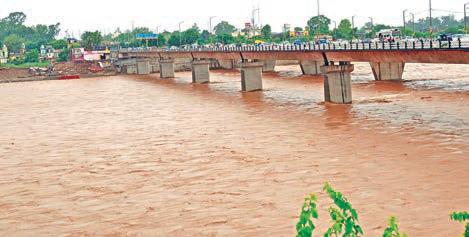 Rains pound Jammu again; rivers flow near alert level, Bhagwati Nagar bridge closed