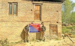 Land, 2-storey house of Pak-based terrorist handler attached