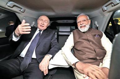 Modi warmly welcomes Putin at Delhi airport; hosts private dinner