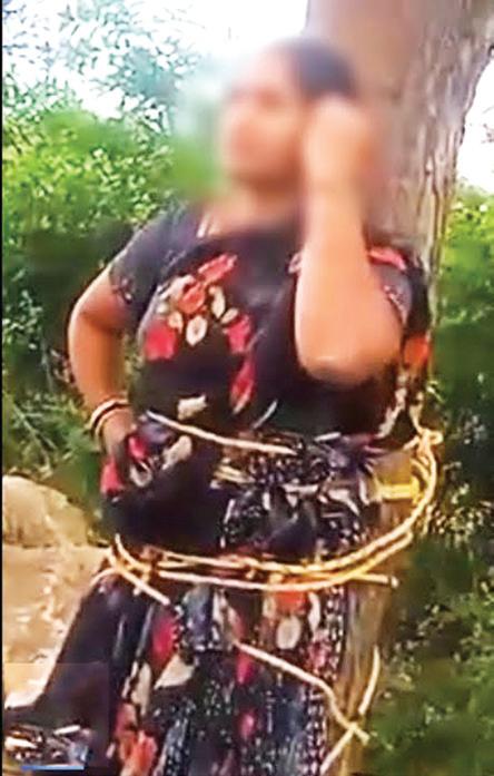 கணவன் வாங்கிய கடனுக்கு இளம்பெண்ணை மரத்தில் கட்டிவைத்த கொடூரம்