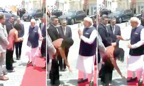 பிரதமர் மோடியின் காலை தொட்டு வணங்கிய சைப்ரஸ் நாடாளுமன்ற உறுப்பினர்