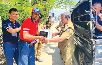 Sinopec supports devotees with fresh water at ‘Sri Dalada Vandanawa’ Kandy