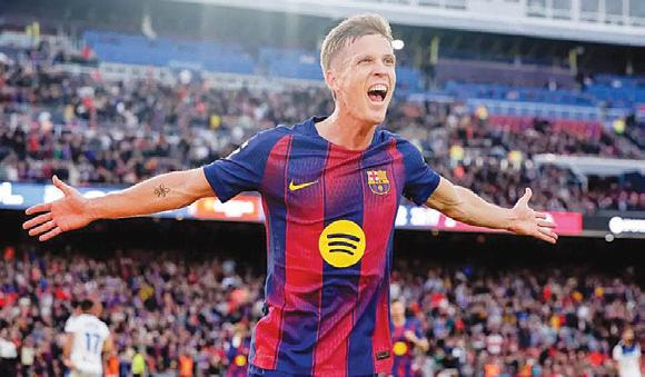 Olmo scores twice as Barca go top of La Liga