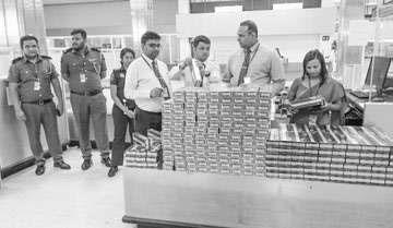 Rs. 115 Mn worth of cigarettes seized at BIA; two arrested
