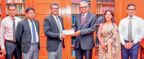 National Savings Bank hands over Rs. 6 Bn dividend to the Treasury