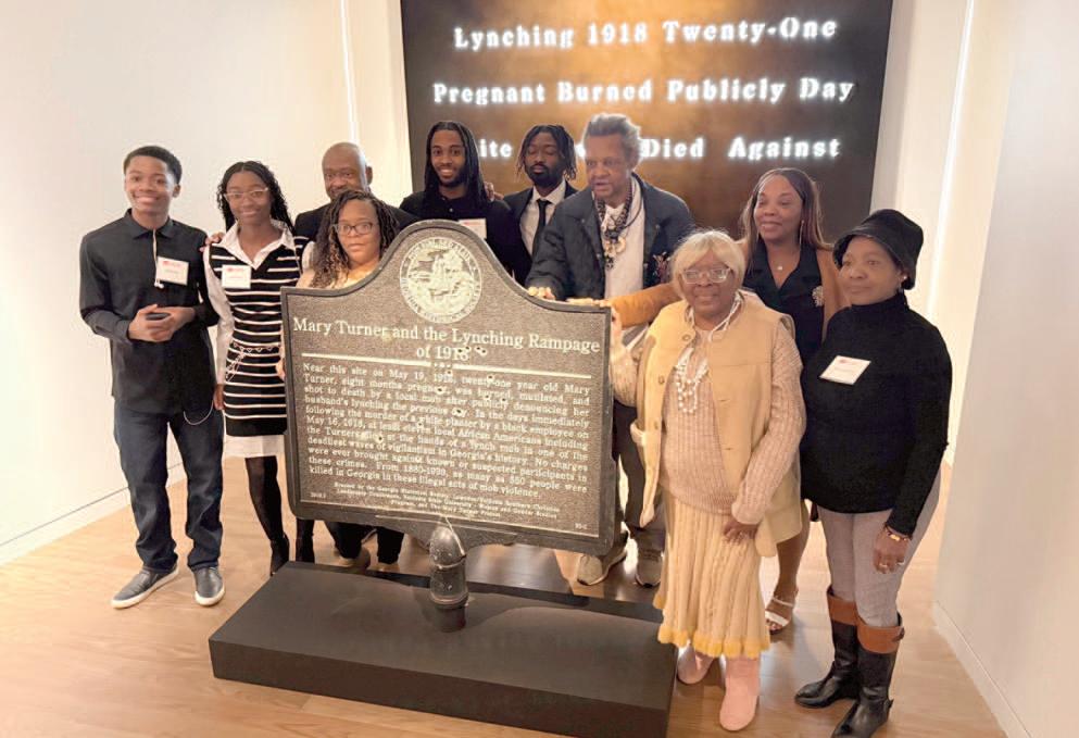 Bullet-pocked marker memorializing 1918 lynching goes on display in Atlanta