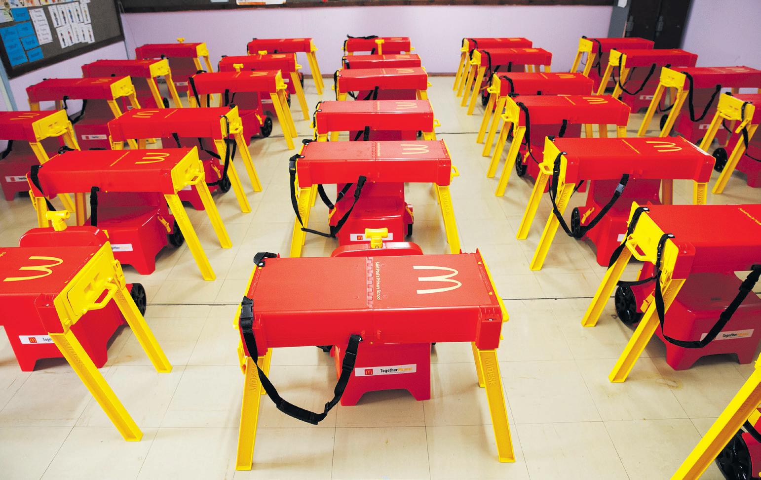 Logos on desks and screens on bikes: how far can advertising be pushed?