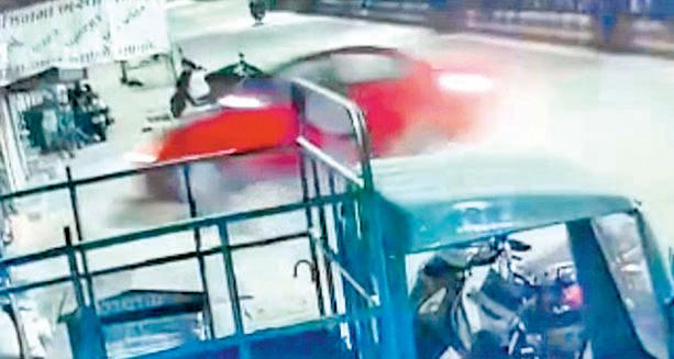 Student rams car into shop, vehicles; one injured