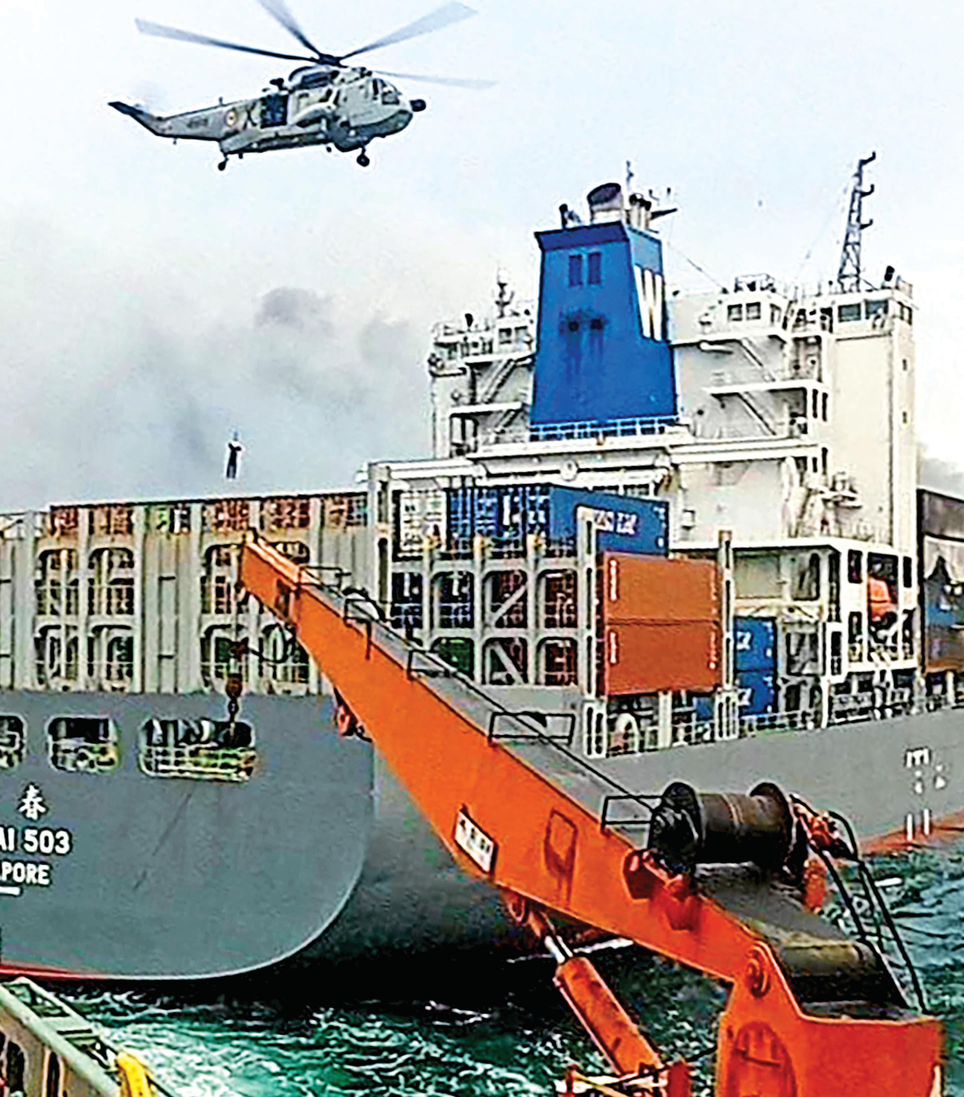 Singapore vessel on fire towed further out to sea