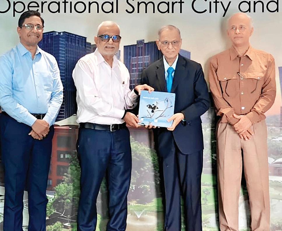 Murthy visits GIFT City, lauds progress