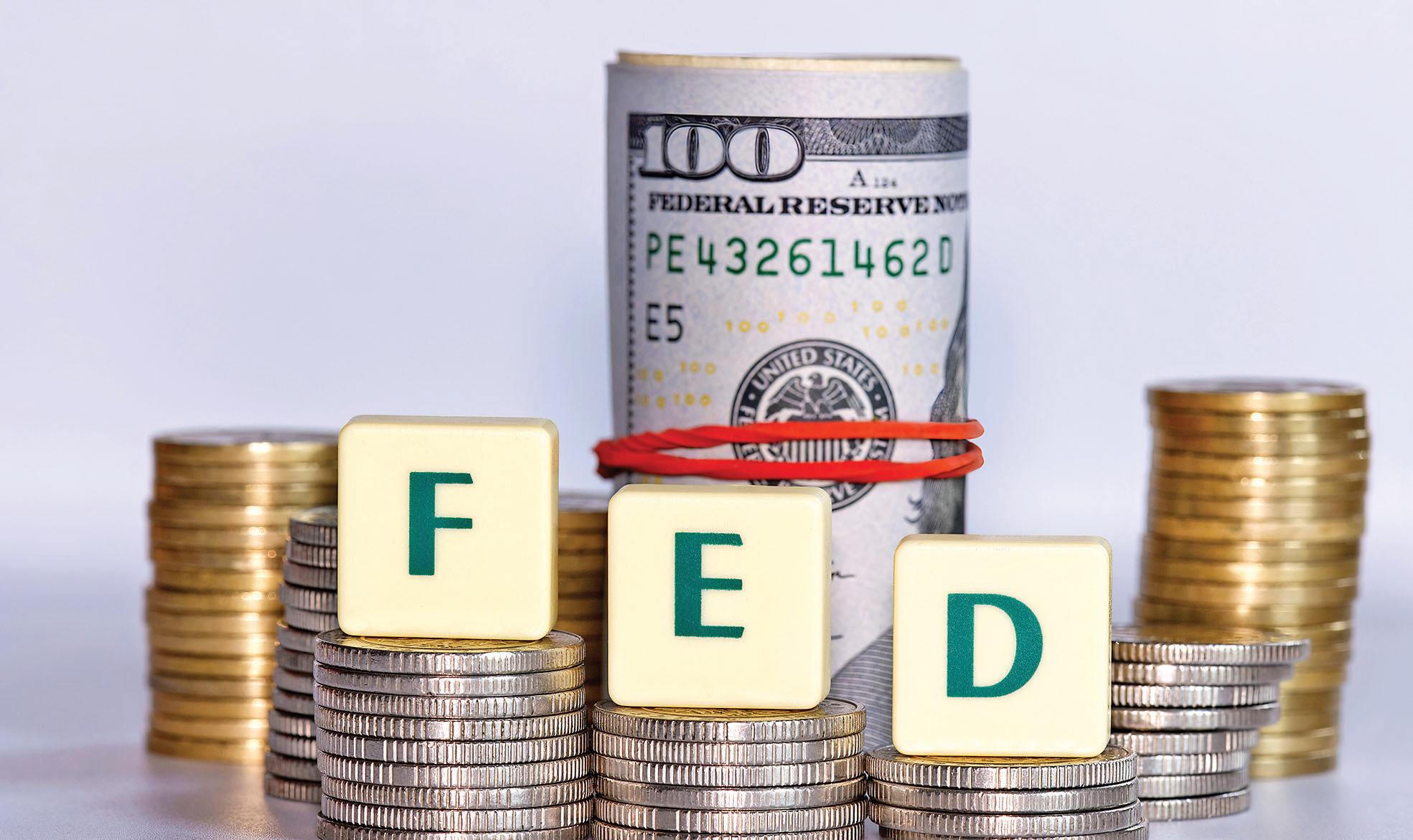 US Fed cuts interest rates by 25 basis pts