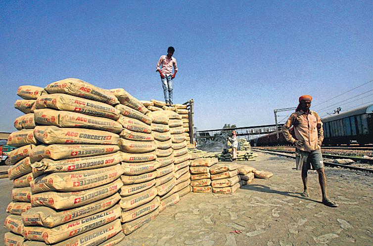 Adani, Aditya Birla locked in a race to expand cement biz