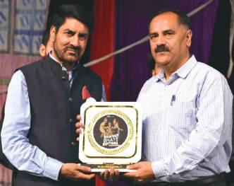 Balwant Thakur felicitates Principal Secy Culture
