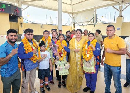 Wushu medal winners accorded rousing reception