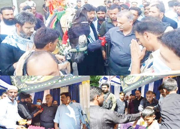 DC Bandipora participates in mourning procession at Sumbal