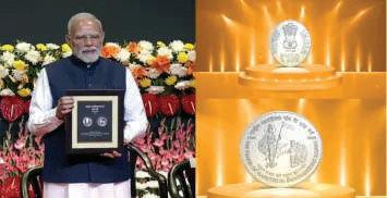 PM releases Rs 100 coin, stamp at RSS centenary
