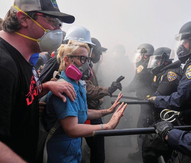 Anti-ICE protesters clash with National Guard