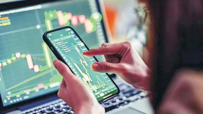 Indian stocks carry forward last week's momentum; Sensex up nearly 300 points