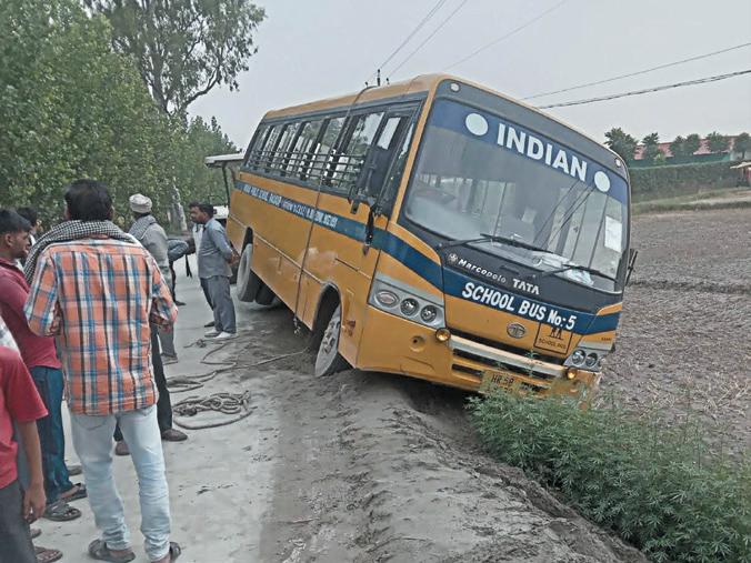 Mishap averted as school bus slips and lands in field
