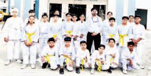 Students of Doon International School make a splash in inter-school karate competition