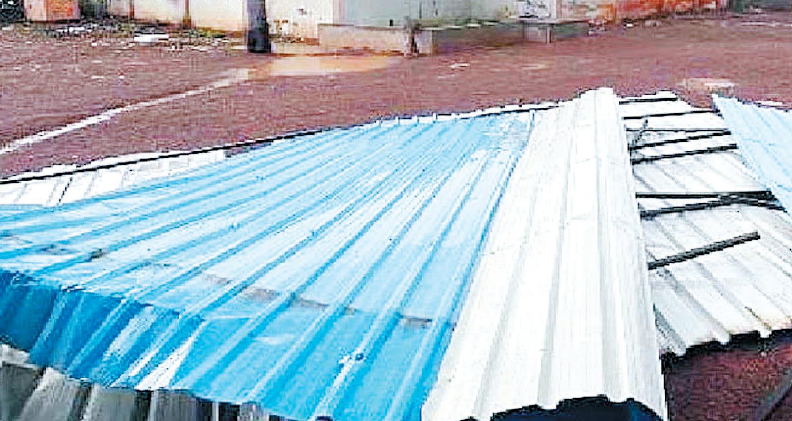 Rice mill's tin sheets torn off in strong storm, many panels damaged