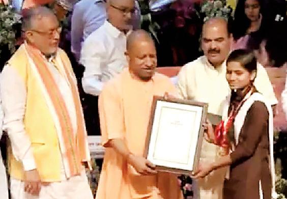 CM Yogi Adityanath felicitates 166 meritorious students, distributes tablets