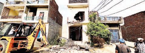 Govt strikes hard in drug war: Illegal assets of drug smugglers bulldozed back to back
