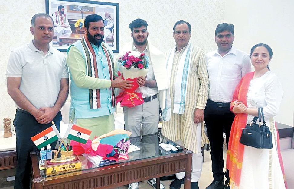 CM Saini felicitates Arsh Gandhi who got 11th rank in NEET and first in Haryana