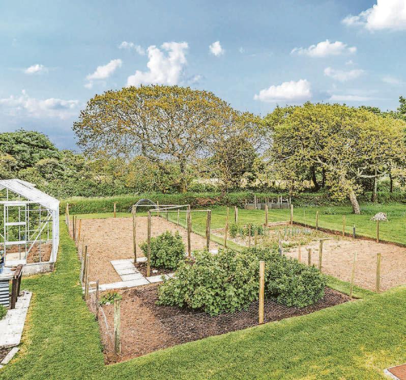 GARDENS ADD TO ITS CHARM