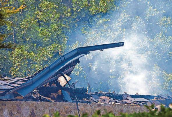 Owners of village home destroyed in blaze are thought to be abroad