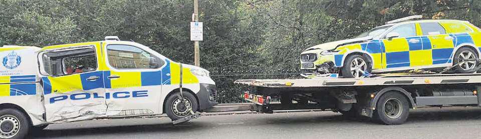 Three officers in hospital after police vehicles crash in city