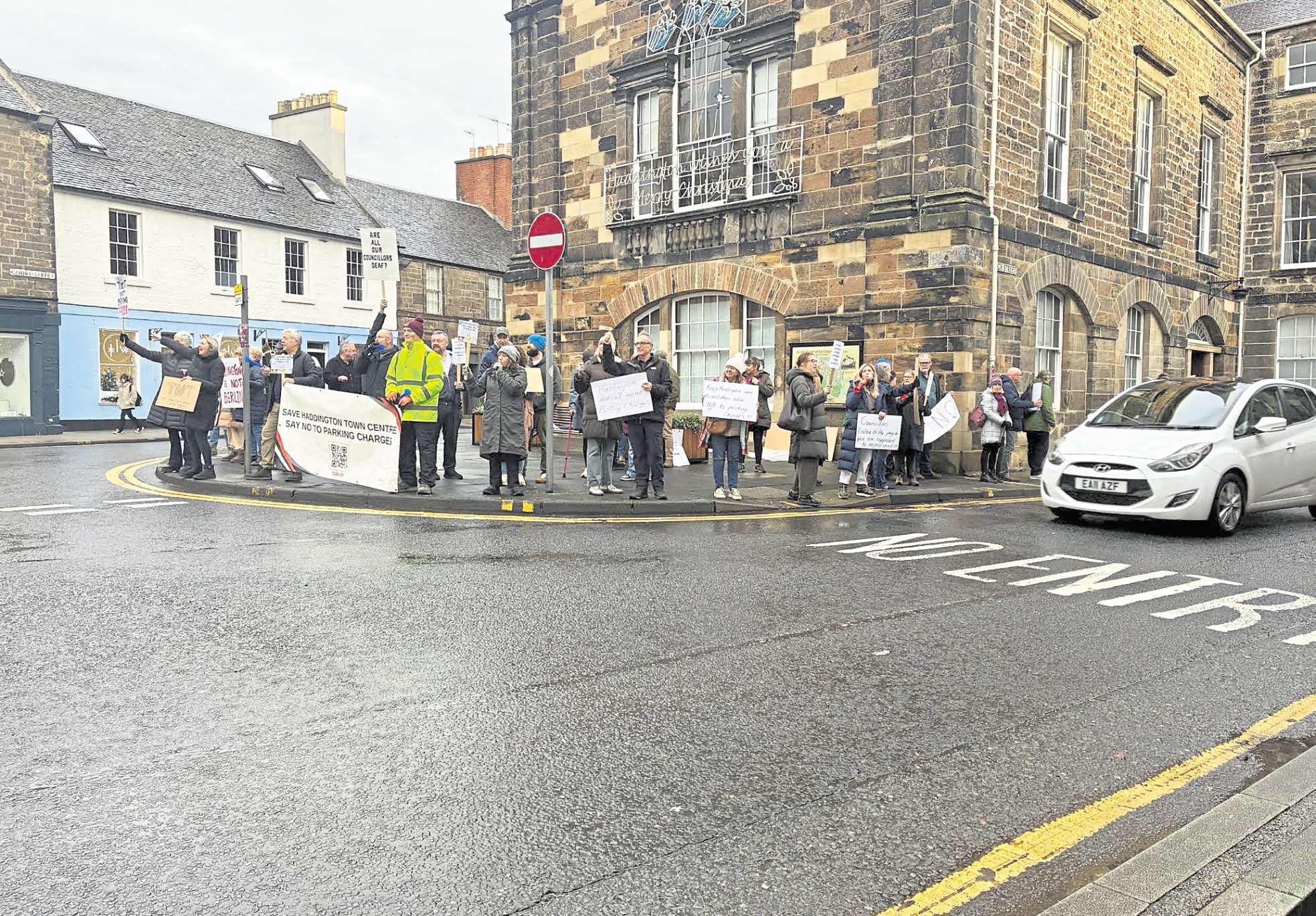 Councillors back next step in controversial parking charges