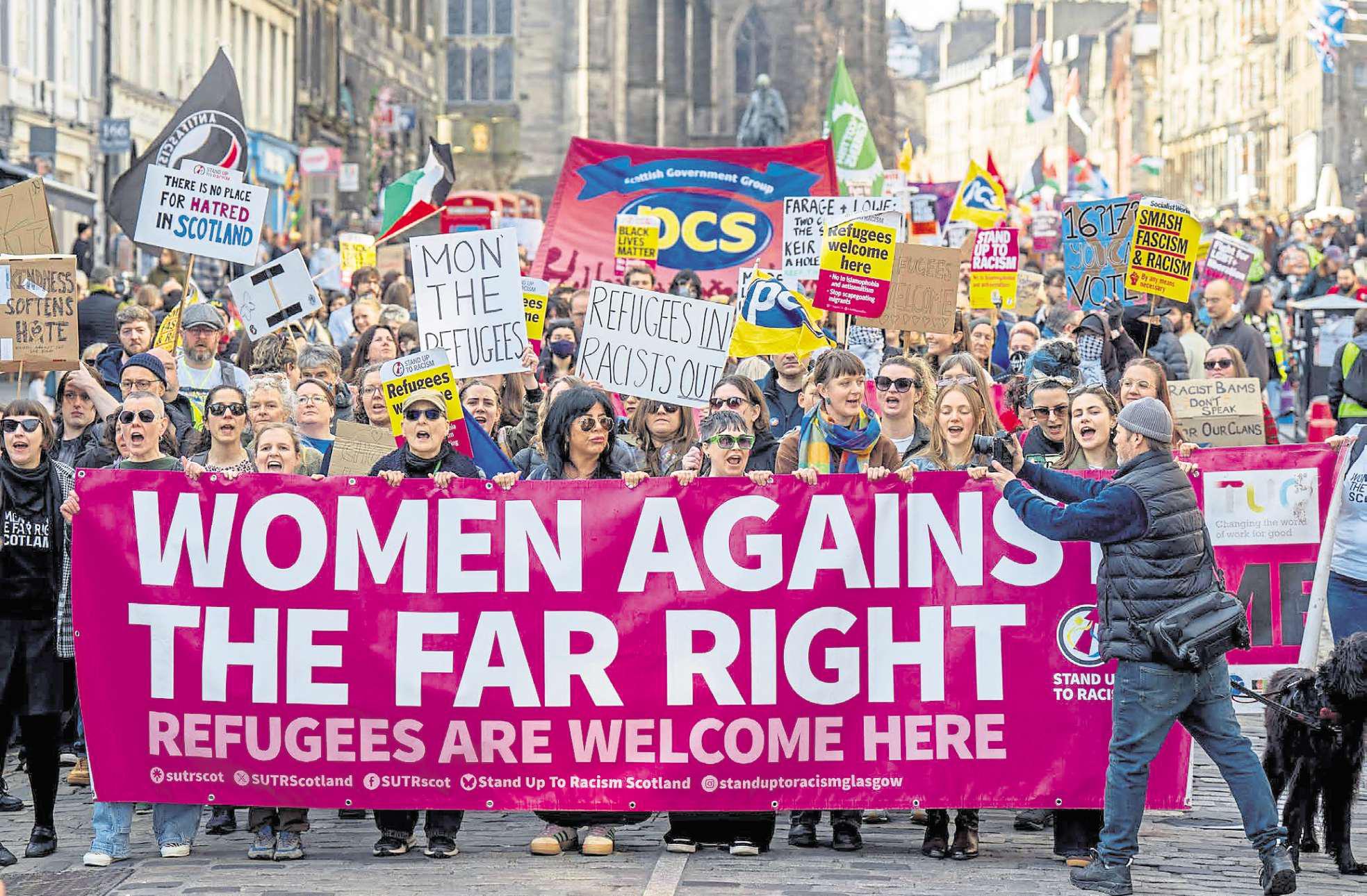 Protest groups exchange angry taunts at Holyrood | Edinburgh Evening ...