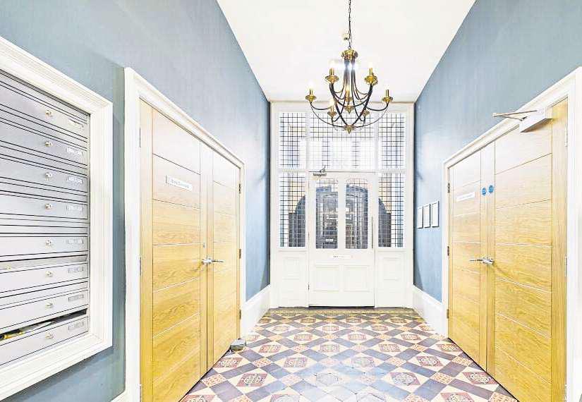 Apartment in converted school offers lessons in stylish living