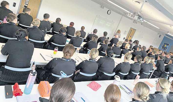 Over 100 police recruits hope 'to make a difference'
