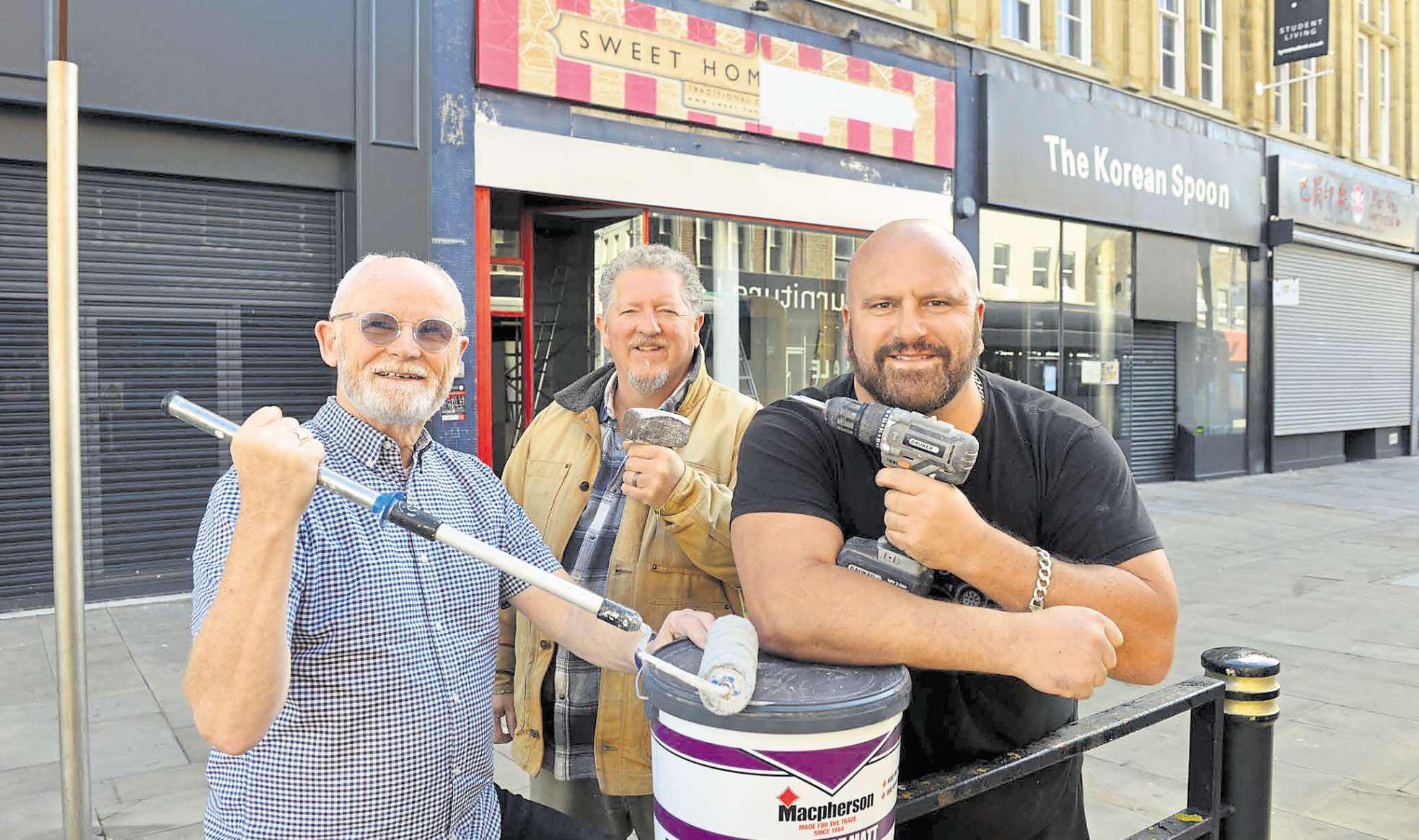 Artists putting their work in the shop window with new high street gallery