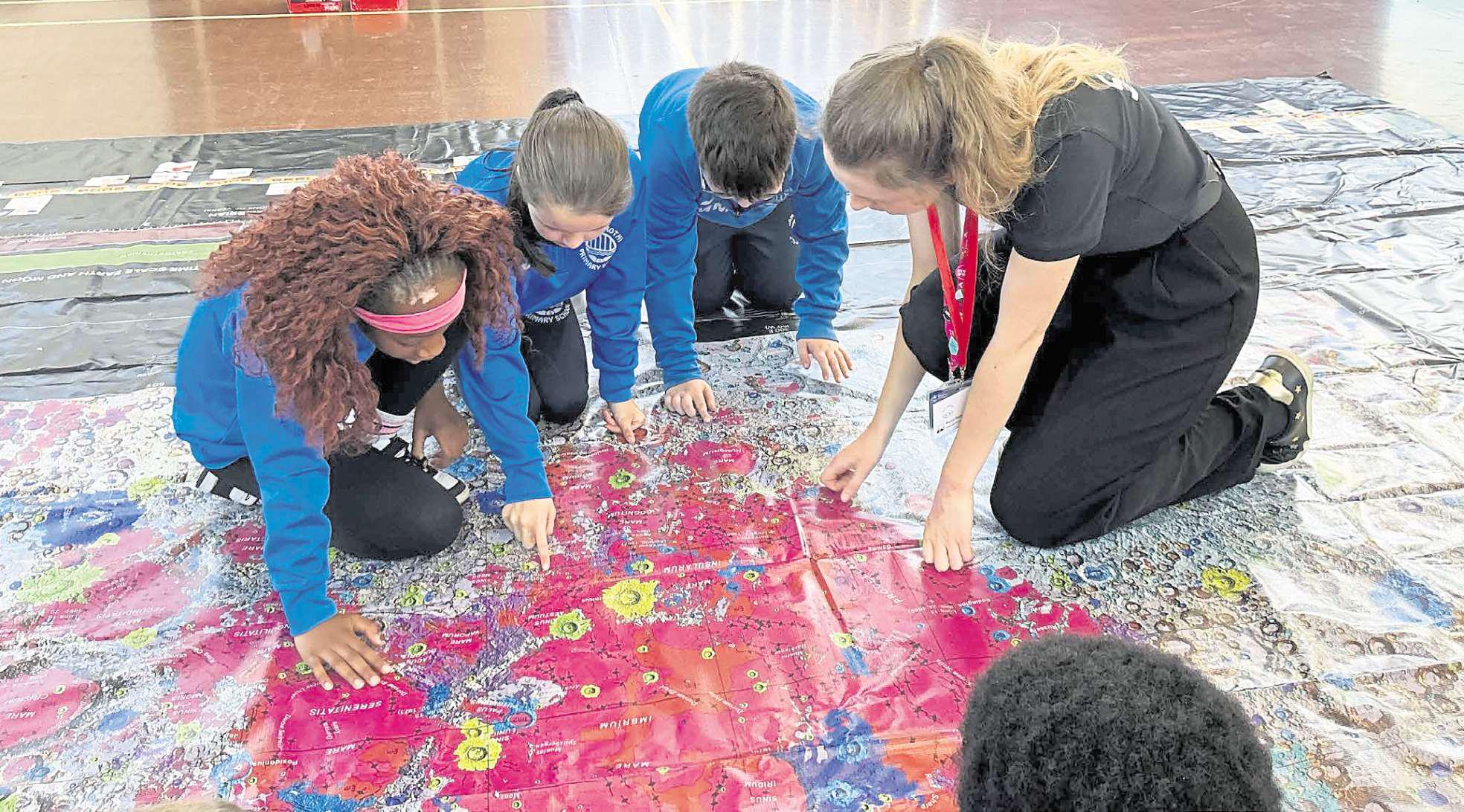 Children try their hand at gardening on the Moon and filming with aliens
