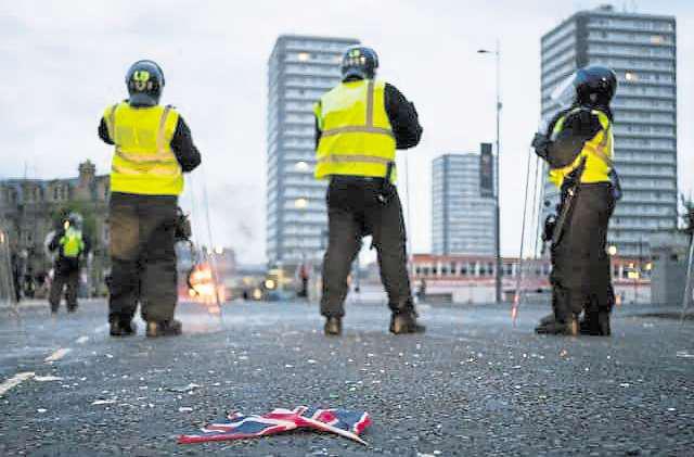 Two men who brandished weapons during racist confrontation jailed