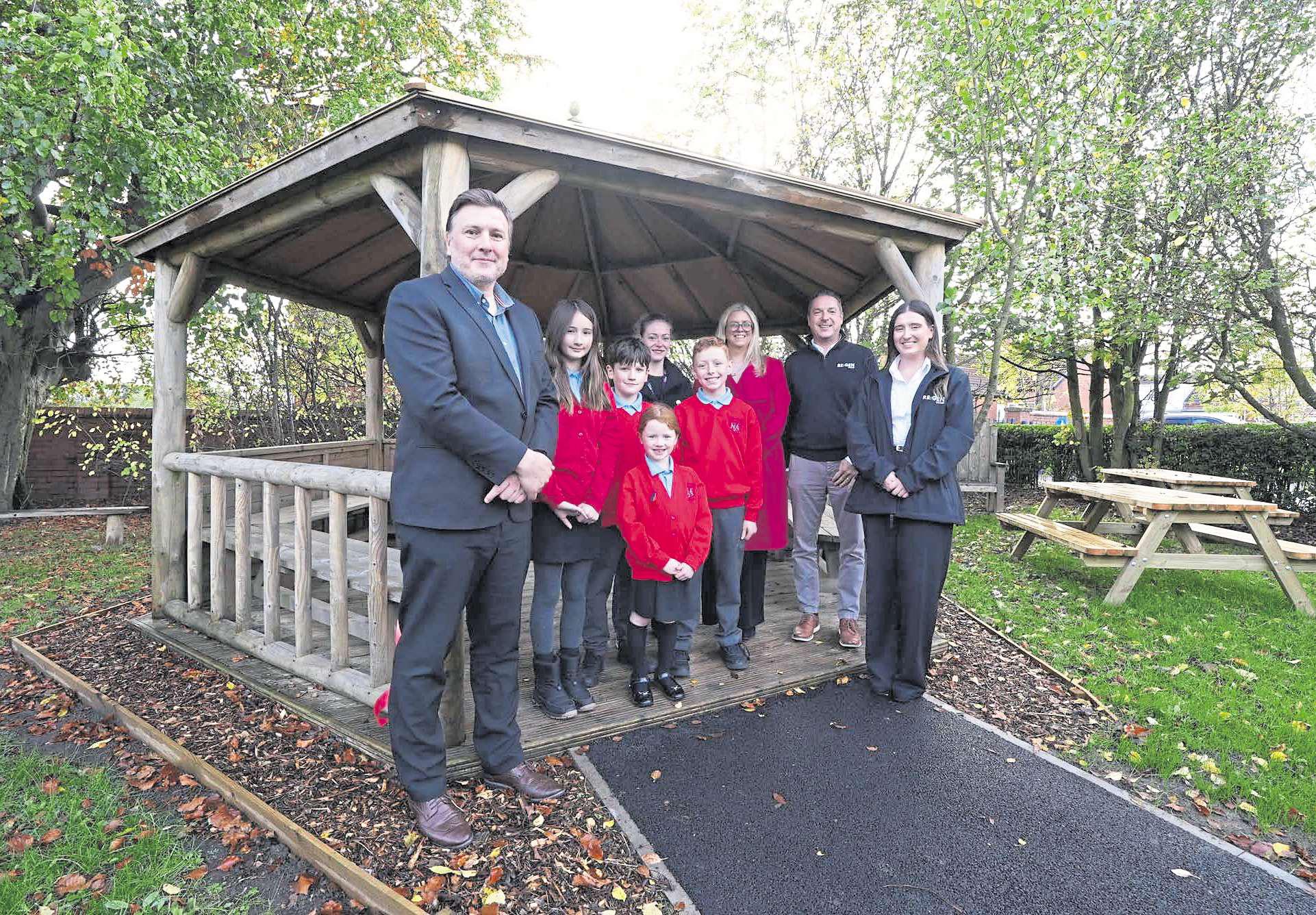 Long-neglected area blossoms into school wellbeing garden