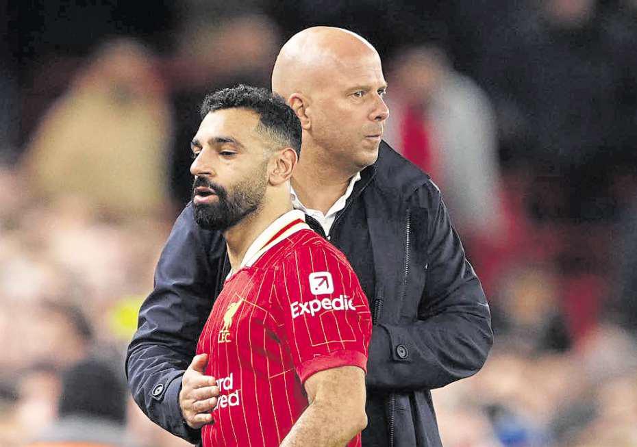 Salah reports for training with future at Liverpool in question