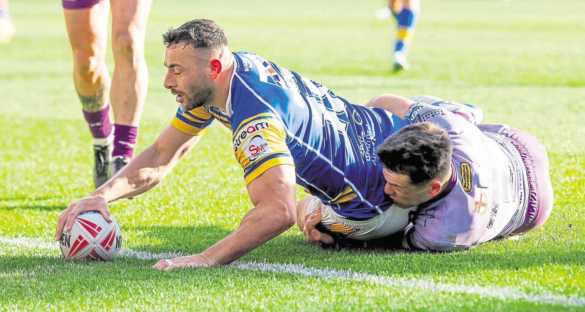 Man of Steel leader playing with a spring in step and a smile on his face
