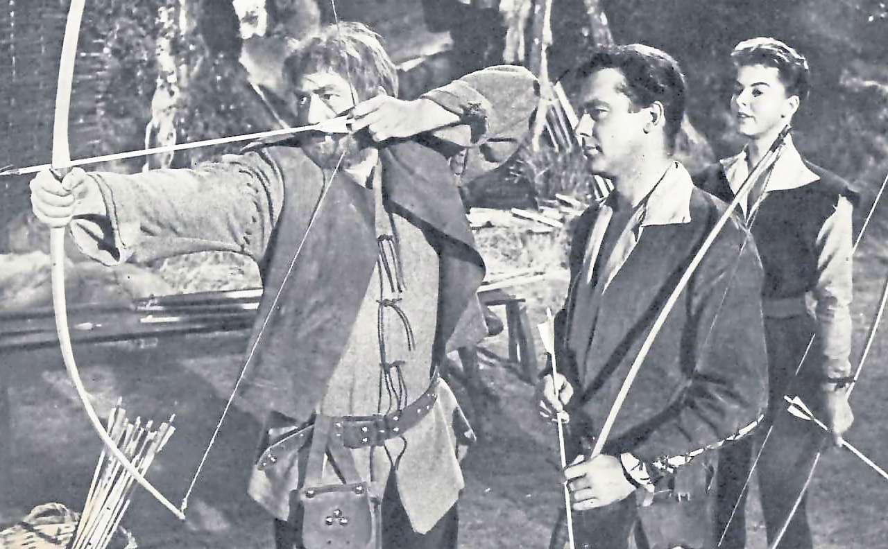 Robin Hood, with his band of men, still riding through the glen