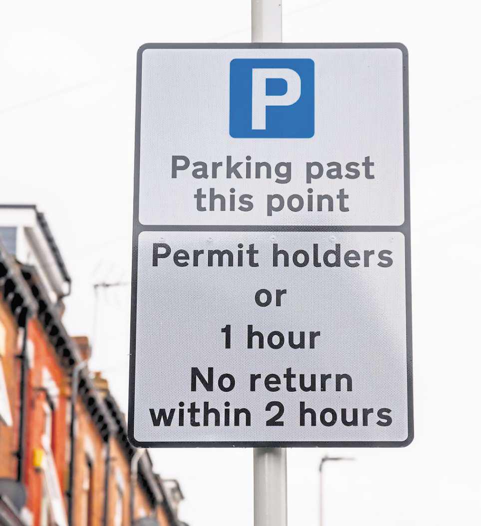 Businesses and temple hit out at permit parking