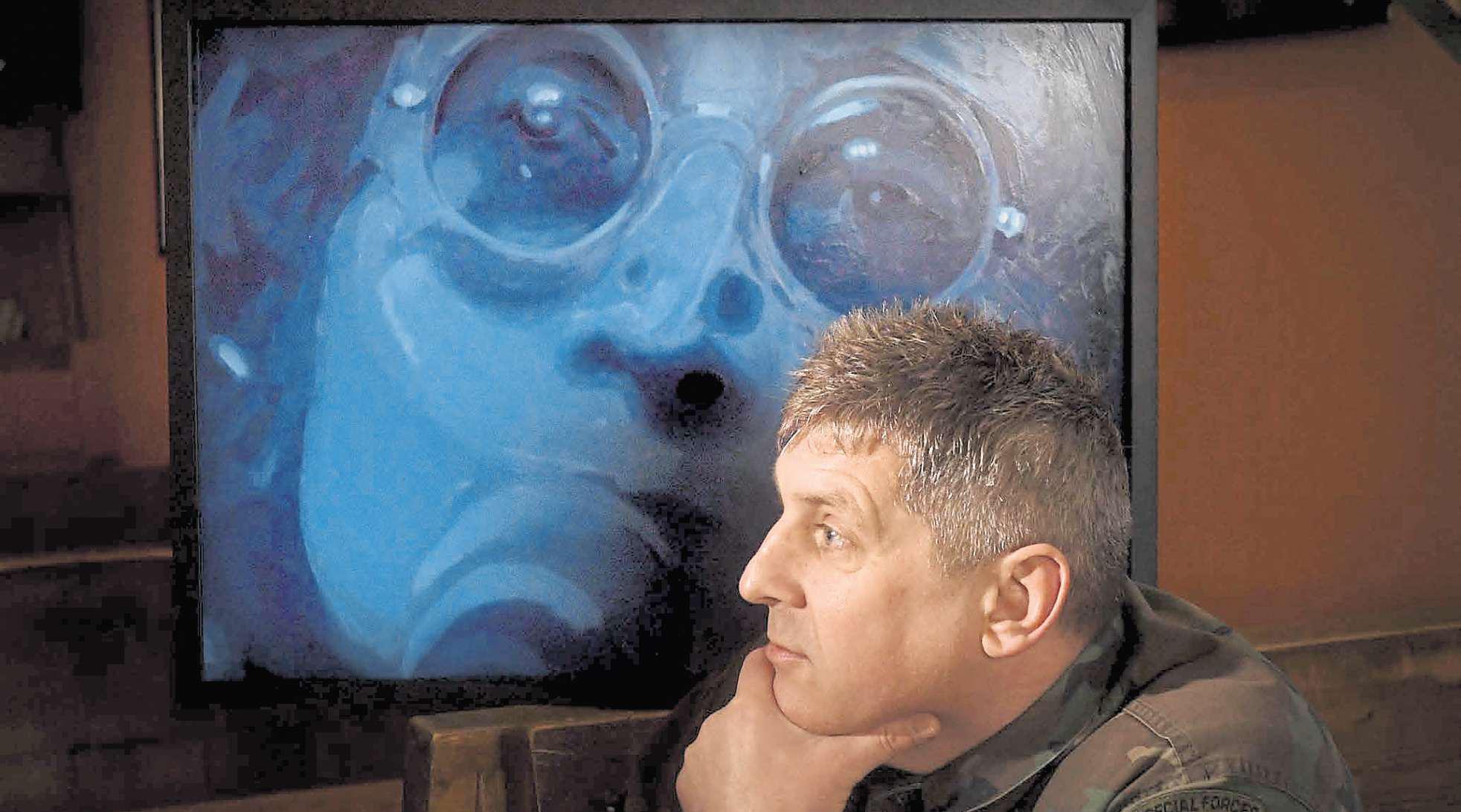 A brush with rock as artist Lee turns his focus from football to music