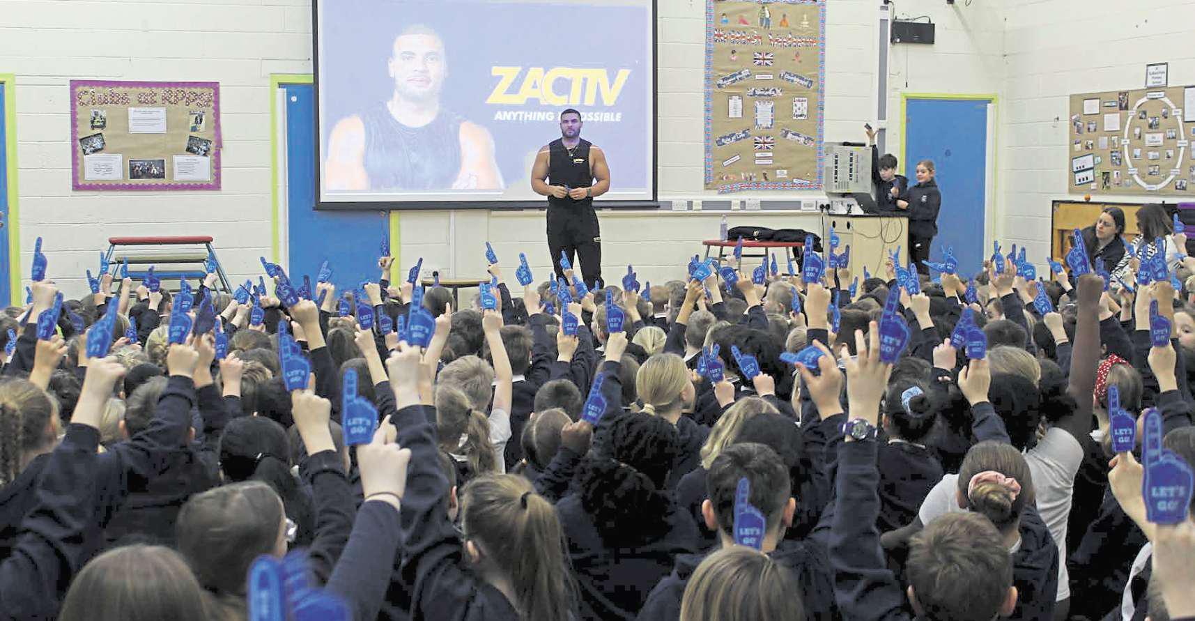 Gladiator star Zach's story inspires pupils